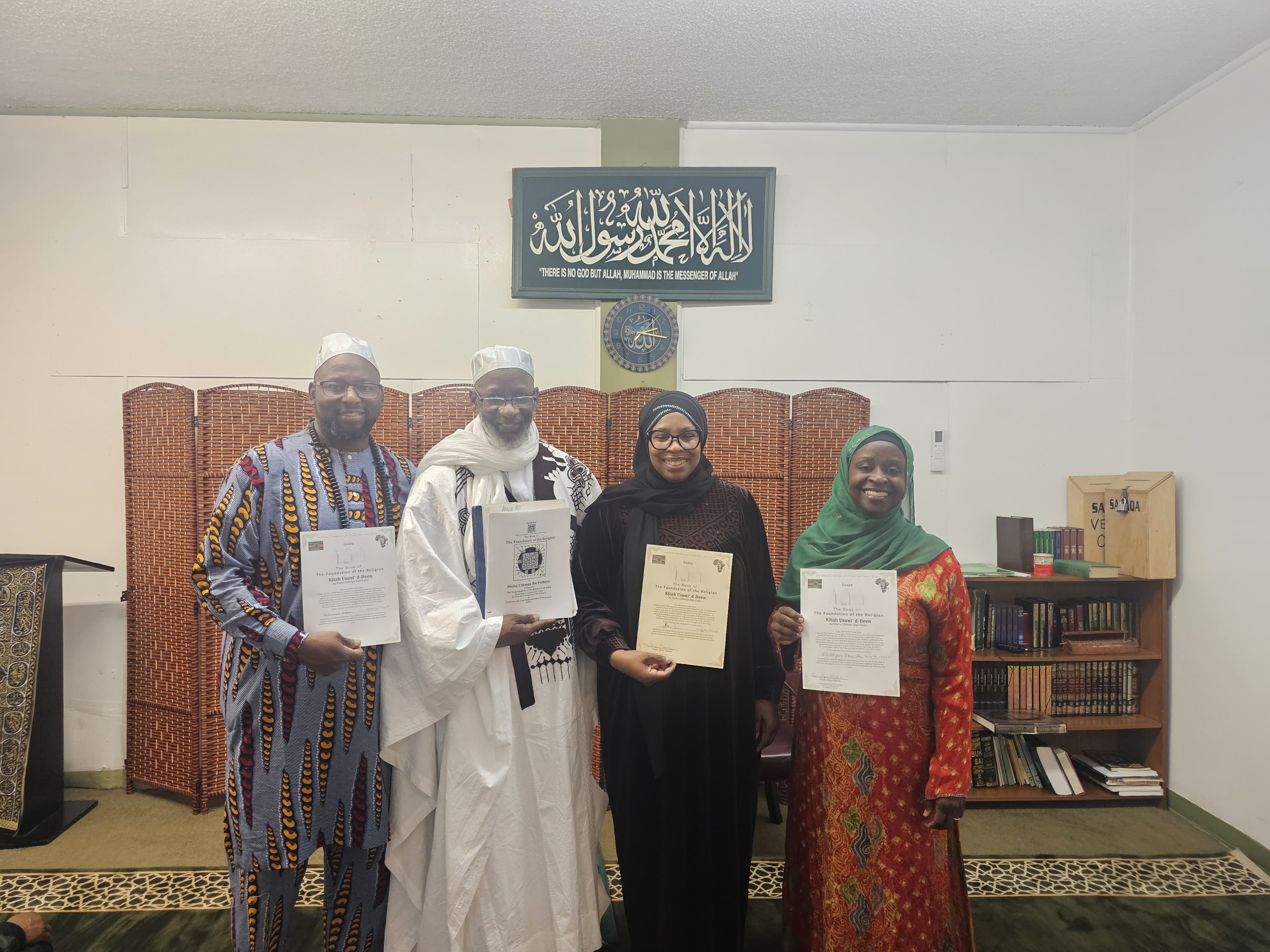 Students receive their Ijazahs in Shehu Uthman Dan Fodio's Kitab Usuu'l d Deen at a ceremony under the Africa's Gates of Return project